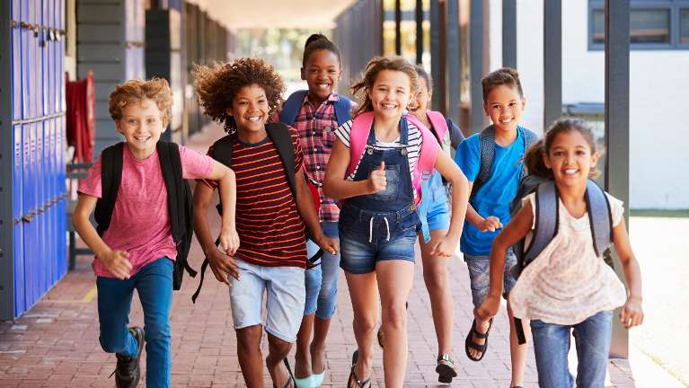 group of school children smiling | dentist garland tx