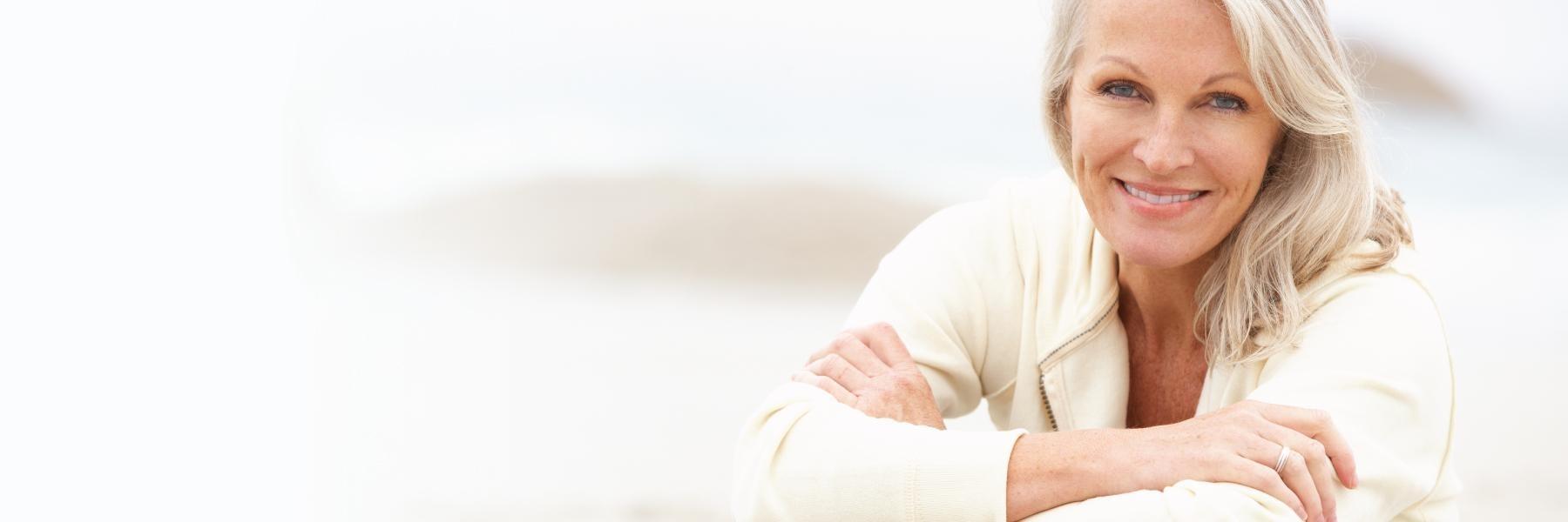 older woman in Garland, smiling with her dental crown